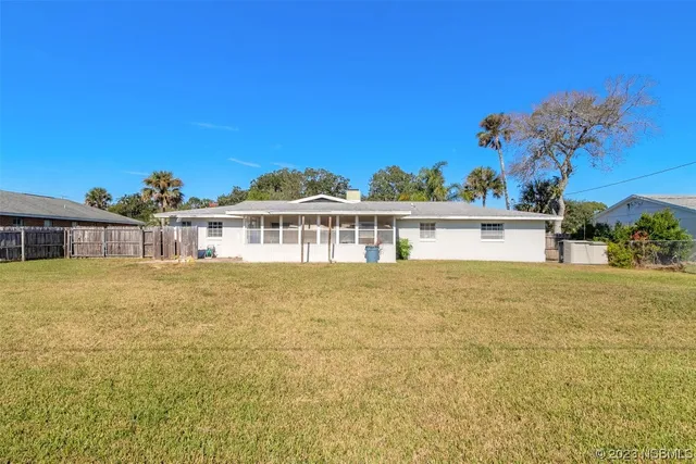 a view of a house with a swimming pool