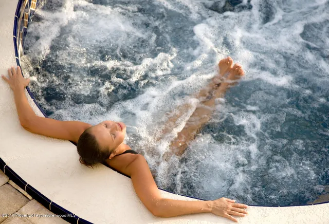 a view of a couch in a backyard