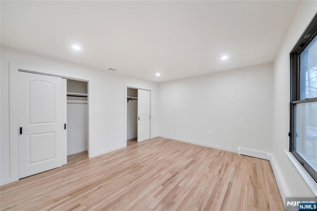 468 Morse Avenue Ridgefield, NJ 07657 - Photo 35 of 48 a view of empty room with wooden floor and fan