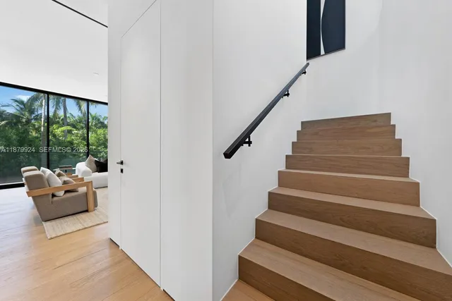a view of a living room with a large window