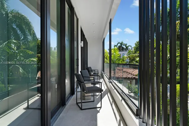 a view of balcony with a garden