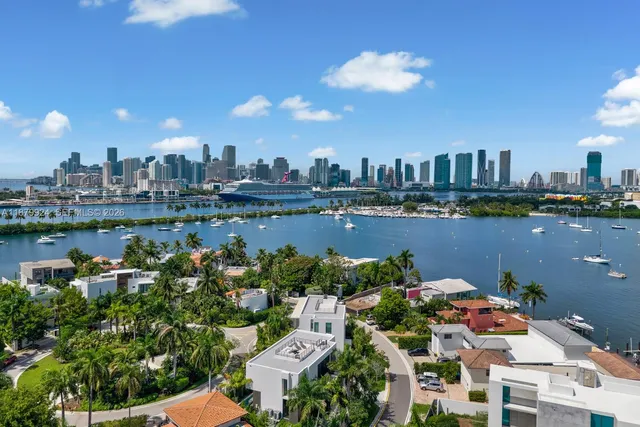 a view of a lake with a city view