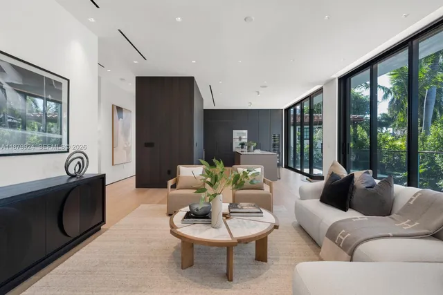 a kitchen with a table and chairs in it