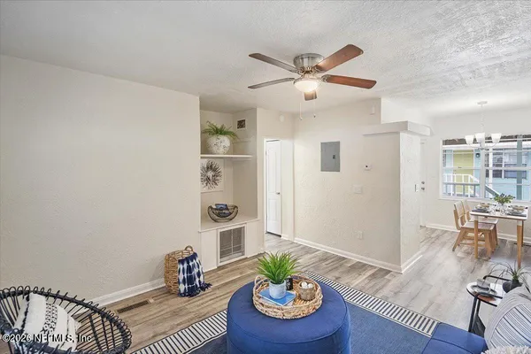 a living room with furniture and window