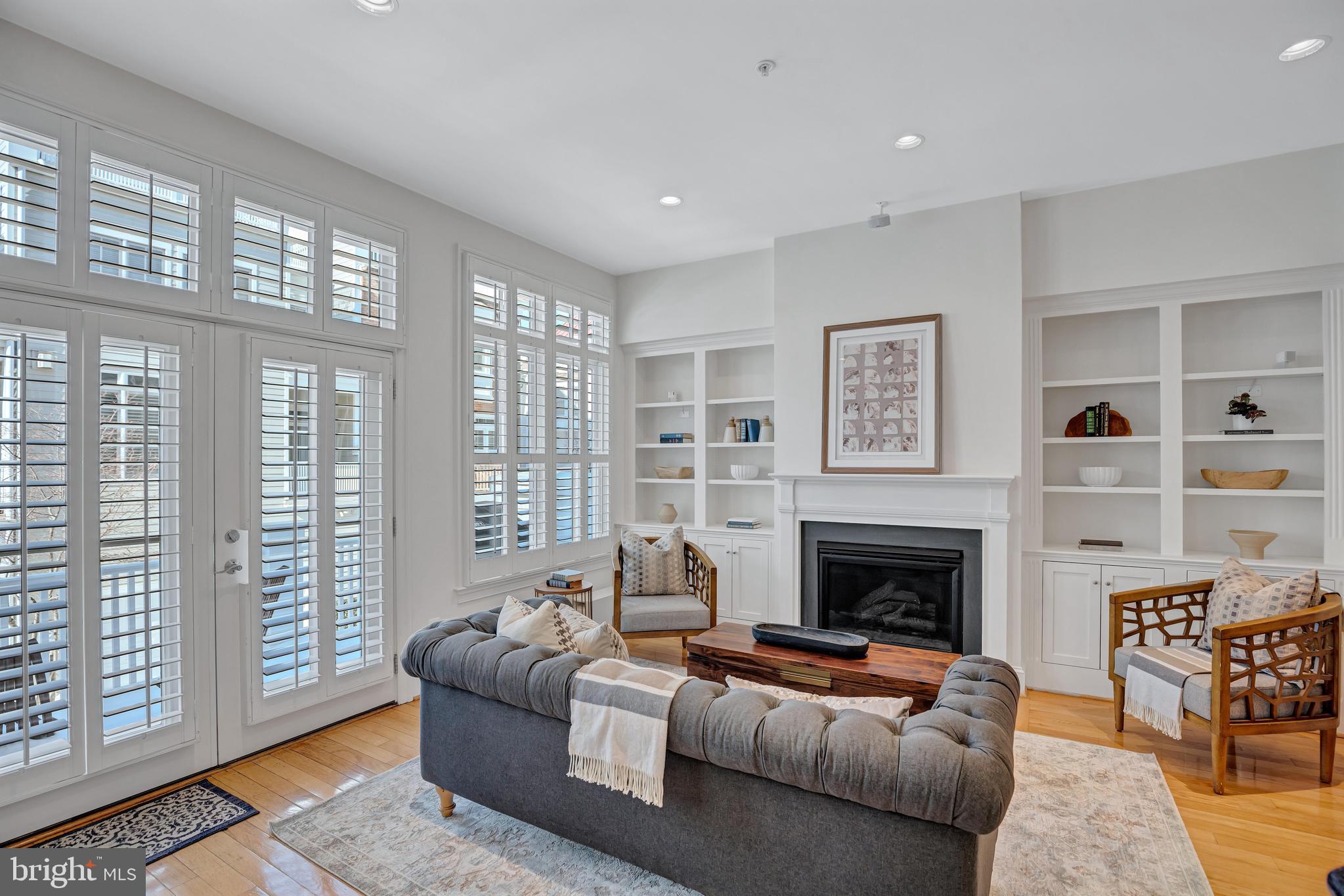 1820 Carpenter Road Alexandria, VA 22314 - Photo 11 of 80 Family Room with Custom Built-in & Gas Fireplace