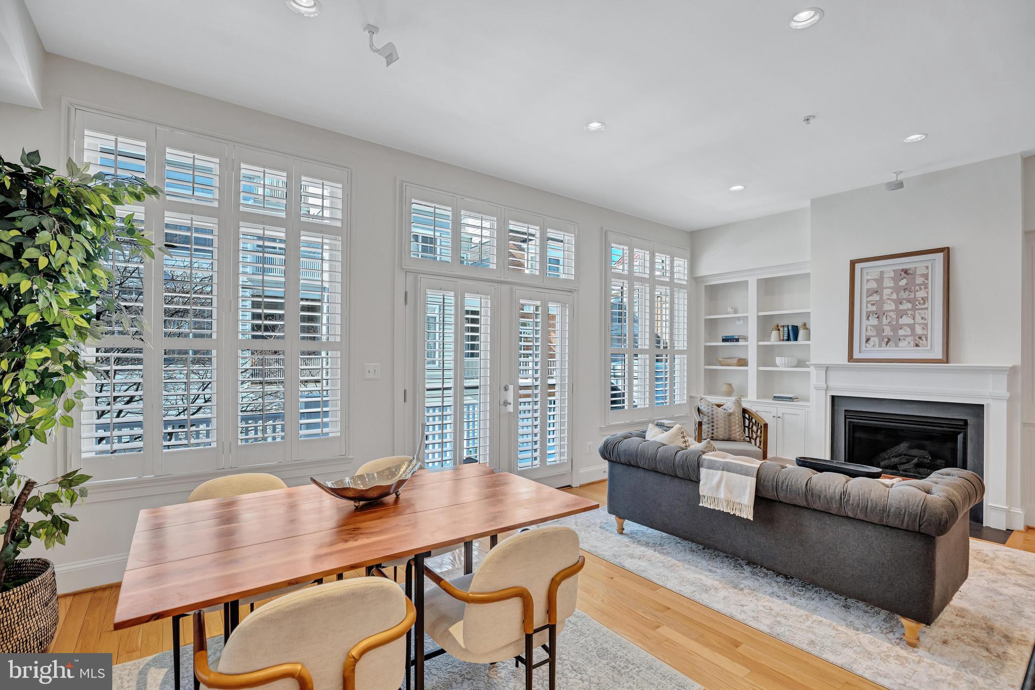 1820 Carpenter Road Alexandria, VA 22314 - Photo 15 of 80 a living room with furniture and a fireplace