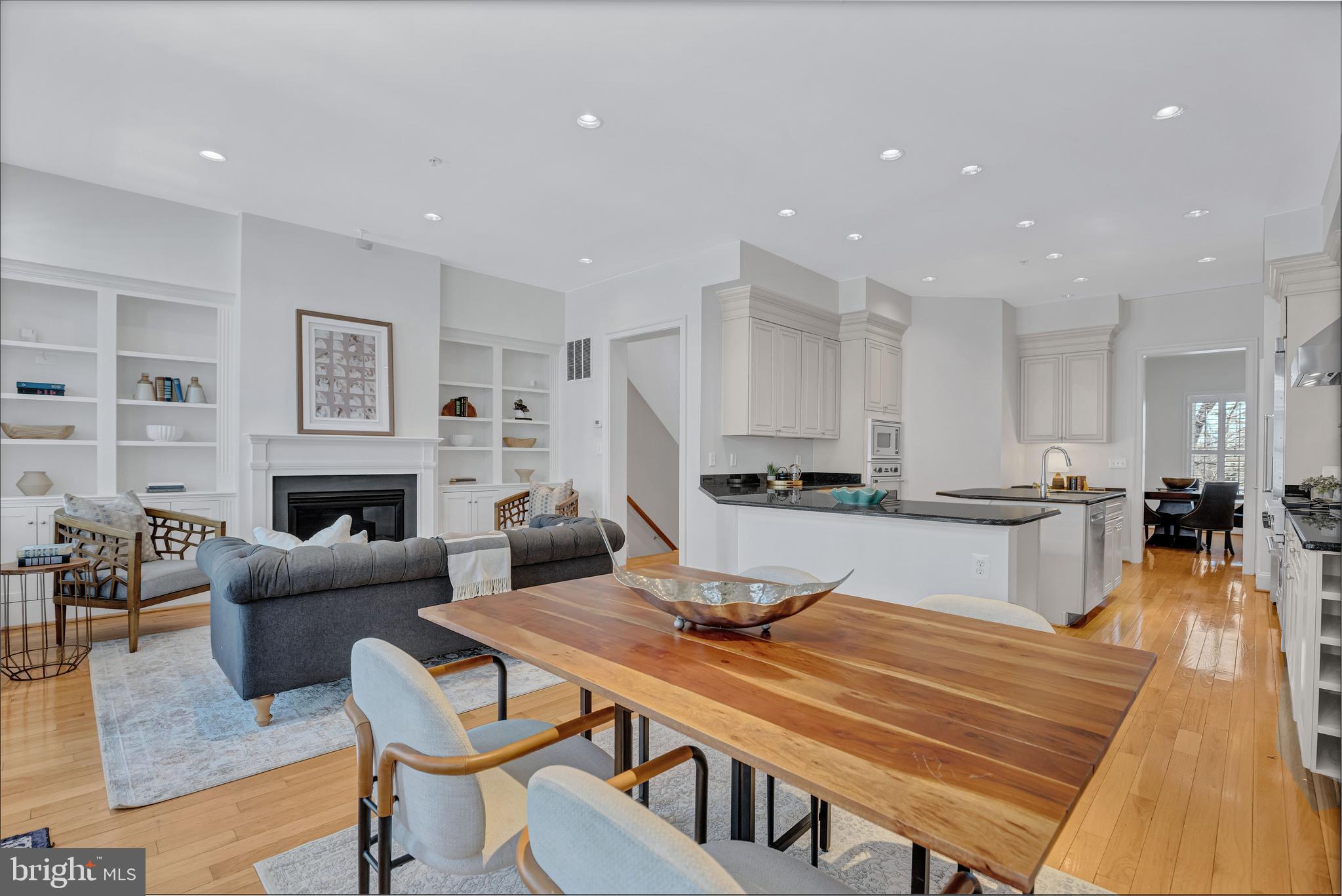 1820 Carpenter Road Alexandria, VA 22314 - Photo 80 of 80 a living room with fireplace furniture and a wooden floor