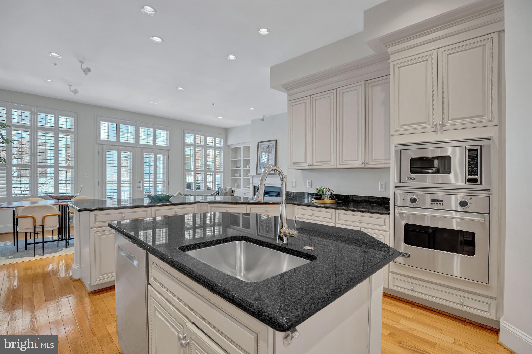 1820 Carpenter Road Alexandria, VA 22314 - Photo 19 of 80 a kitchen with stainless steel appliances granite countertop a sink a stove and a granite counter tops