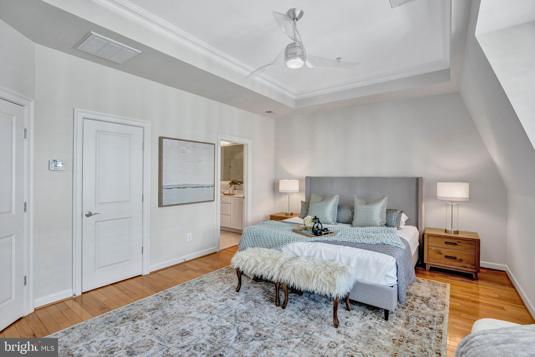 1820 Carpenter Road Alexandria, VA 22314 - Photo 30 of 80 a bedroom with a bed and a couch