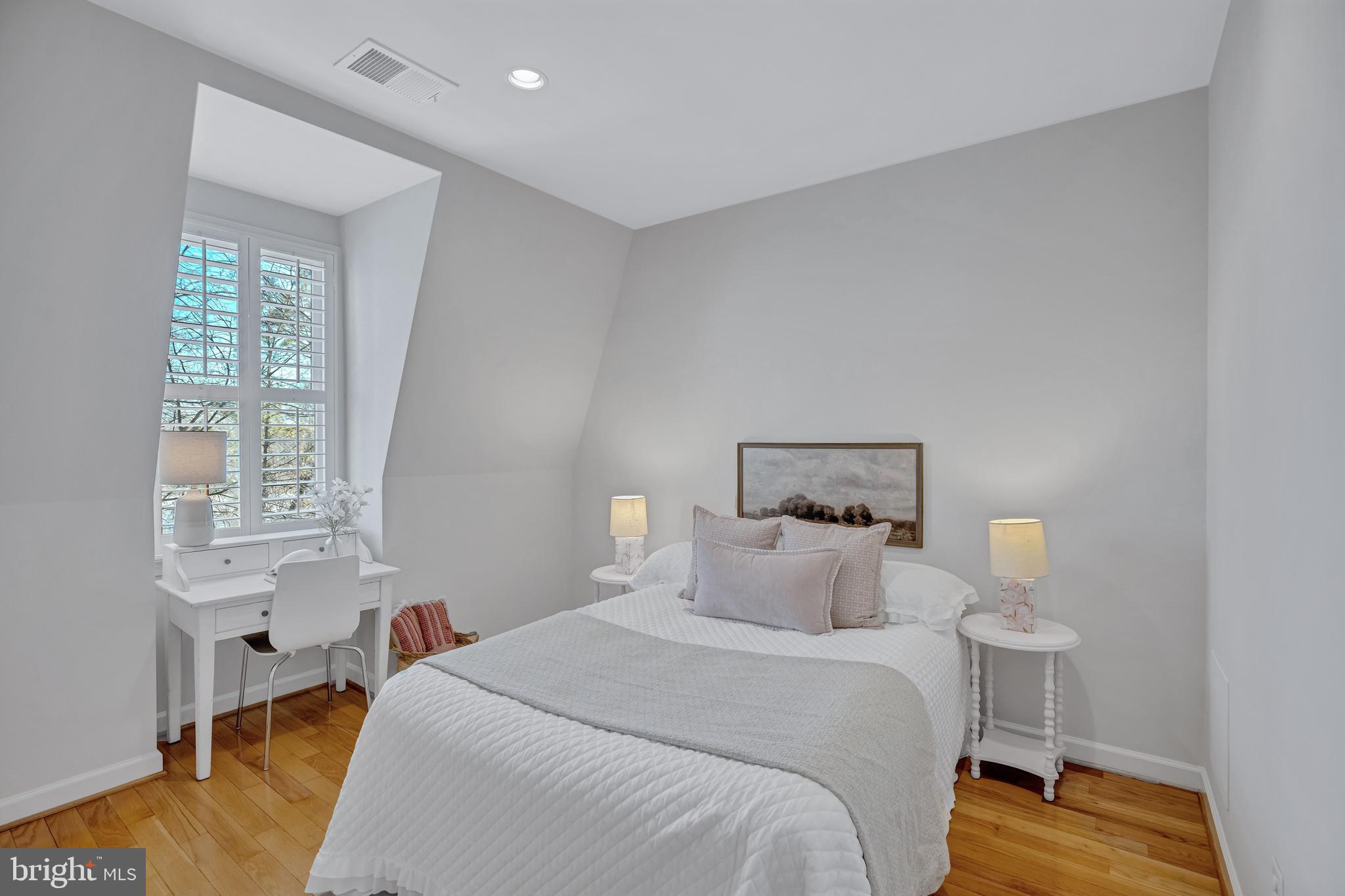 1820 Carpenter Road Alexandria, VA 22314 - Photo 42 of 80 a bedroom with a bed and a window