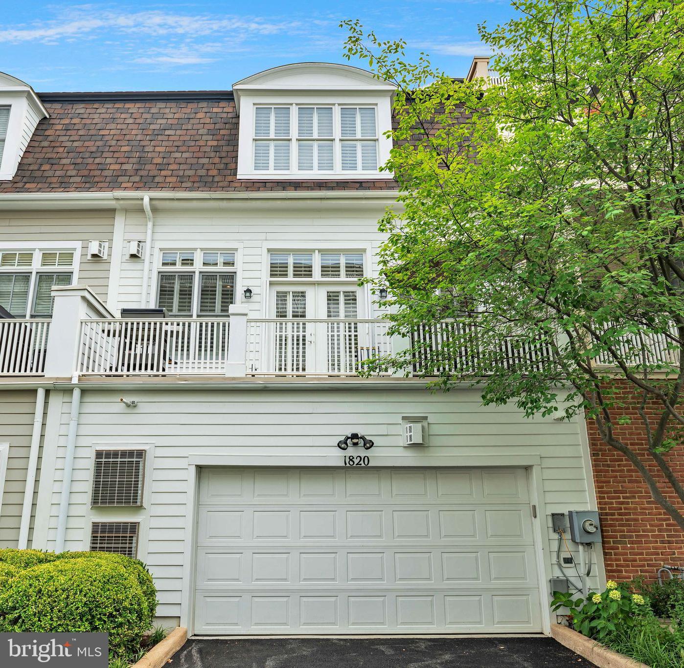 1820 Carpenter Road Alexandria, VA 22314 - Photo 44 of 80 a front view of a house with a garden