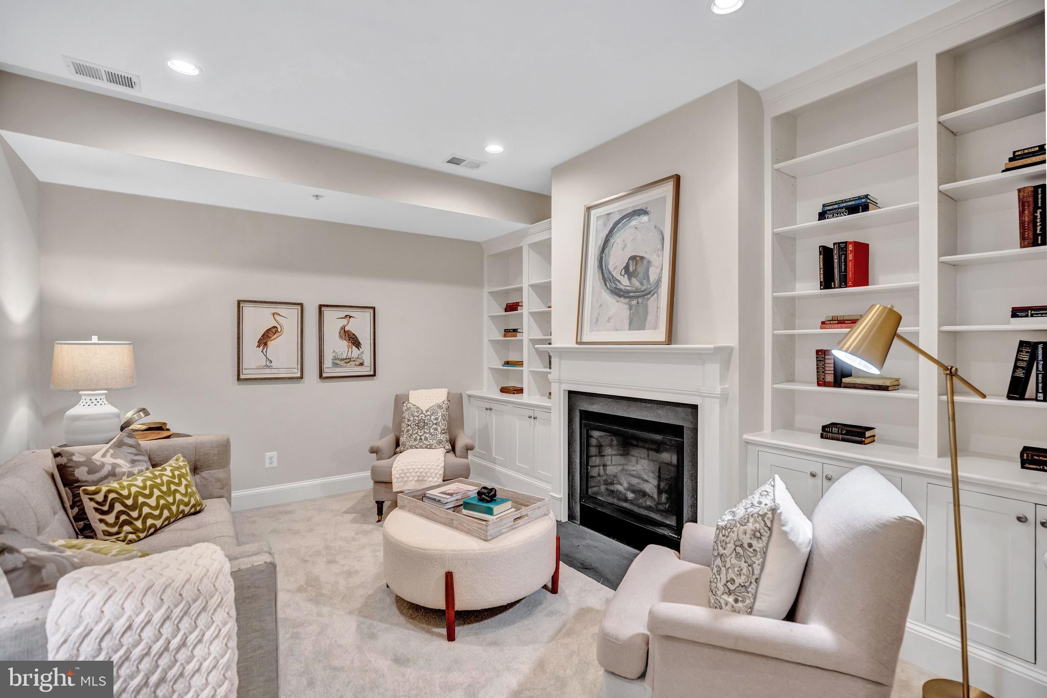 1820 Carpenter Road Alexandria, VA 22314 - Photo 8 of 80 a living room with furniture and a fireplace