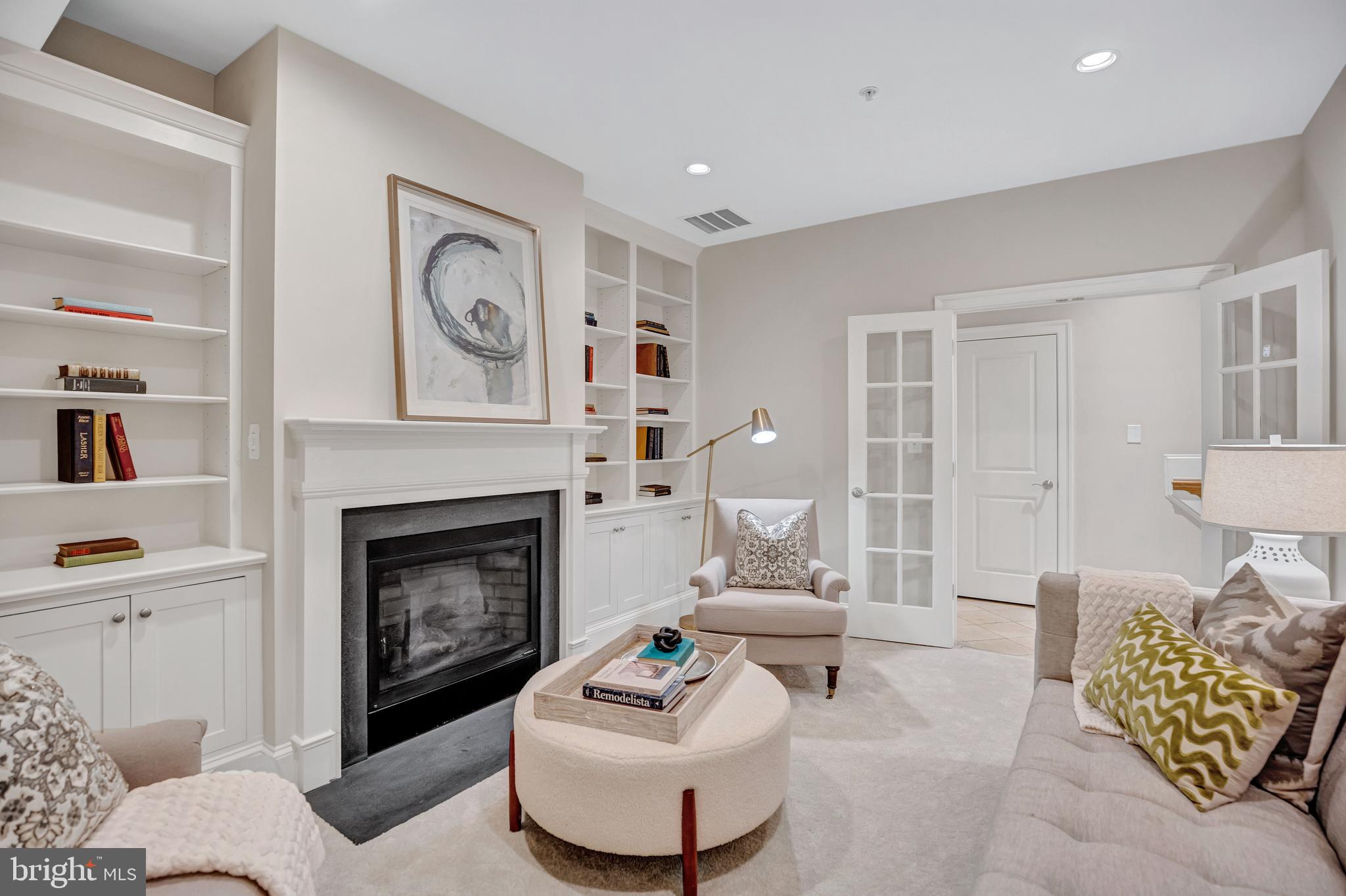 1820 Carpenter Road Alexandria, VA 22314 - Photo 9 of 80 a living room with furniture and a fireplace