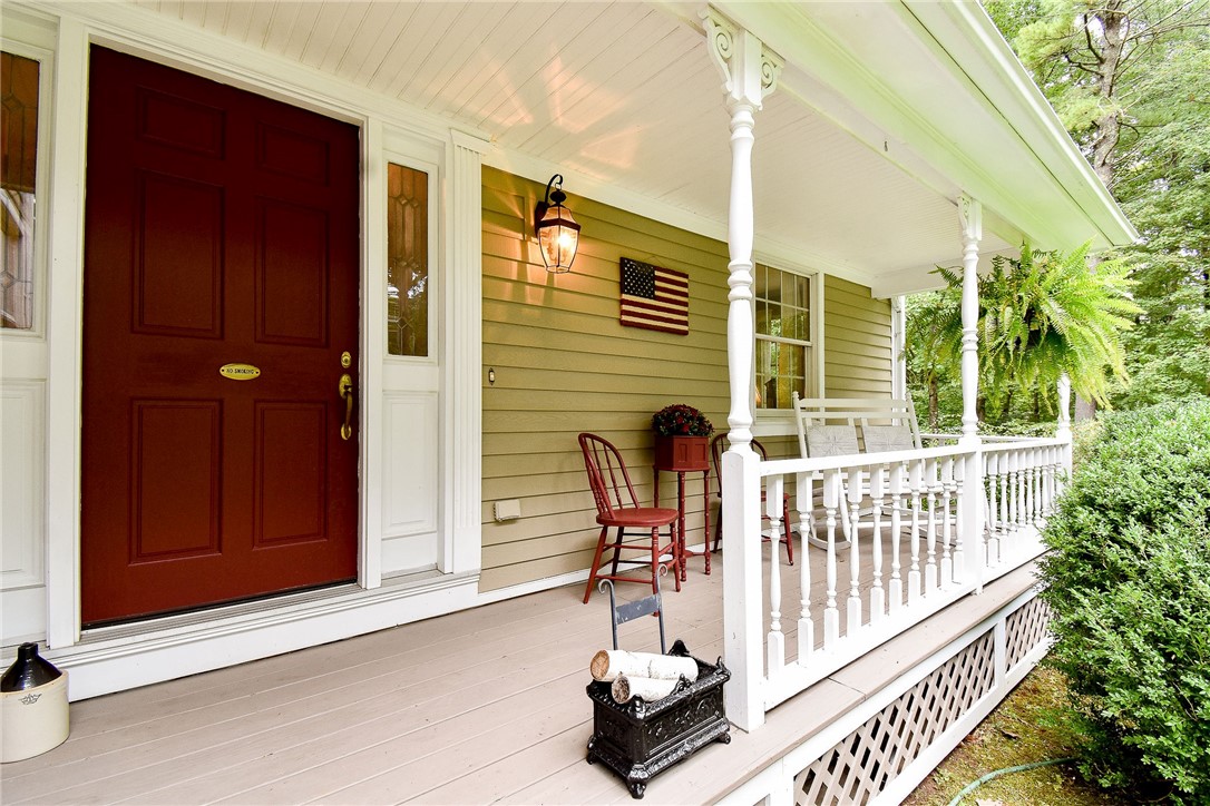 405 Lapham Farm Road Burrillville, RI 02859 - Photo 8 of 50 Second porch enters into living room