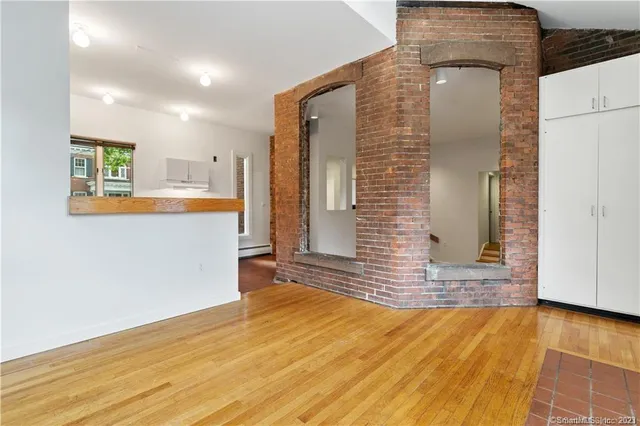 a view of a kitchen cabinets and a kitchen counter top space