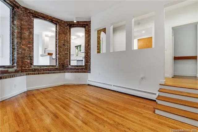 a view of an empty room and window