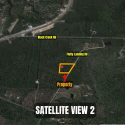 Xx Fluffy Landing Road Freeport, FL 32439 - Photo 7 of 8 a sign that is on the side of the road