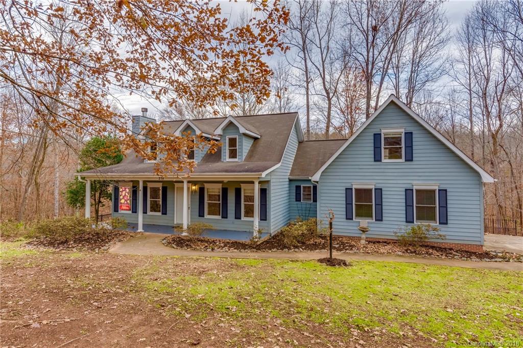278 Bent Tree Drive Rutherfordton, NC 28139 - Photo 1 of 29 a front view of house with yard and trees around
