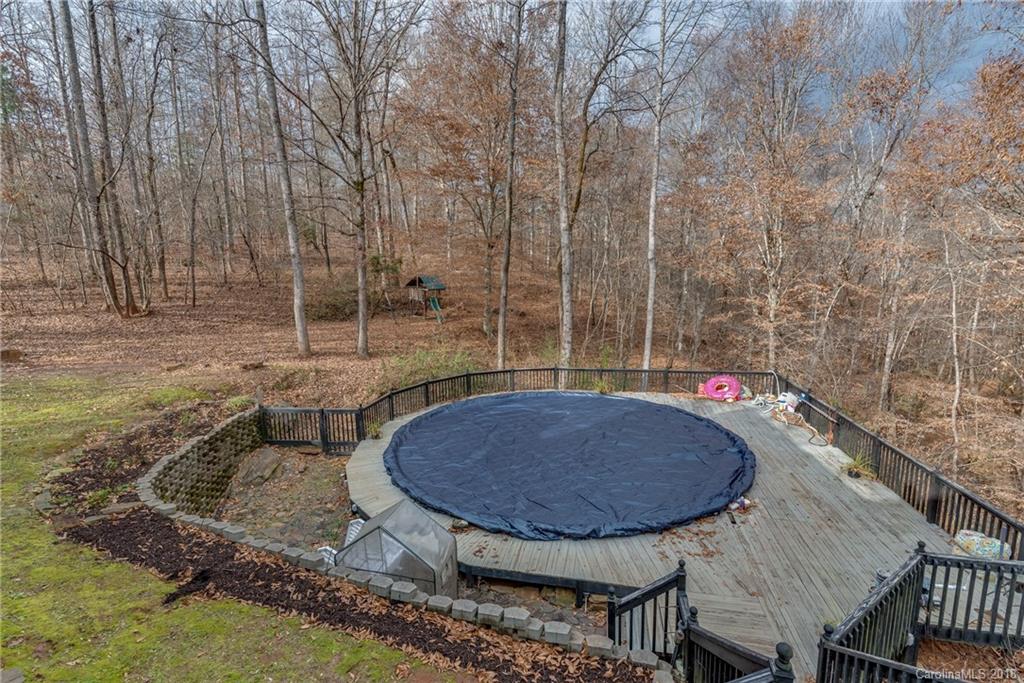 278 Bent Tree Drive Rutherfordton, NC 28139 - Photo 22 of 29 a view of a backyard with table and chairs