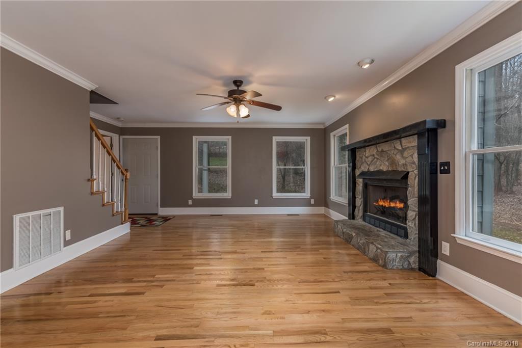 278 Bent Tree Drive Rutherfordton, NC 28139 - Photo 6 of 29 a view of an empty room with window and fire place