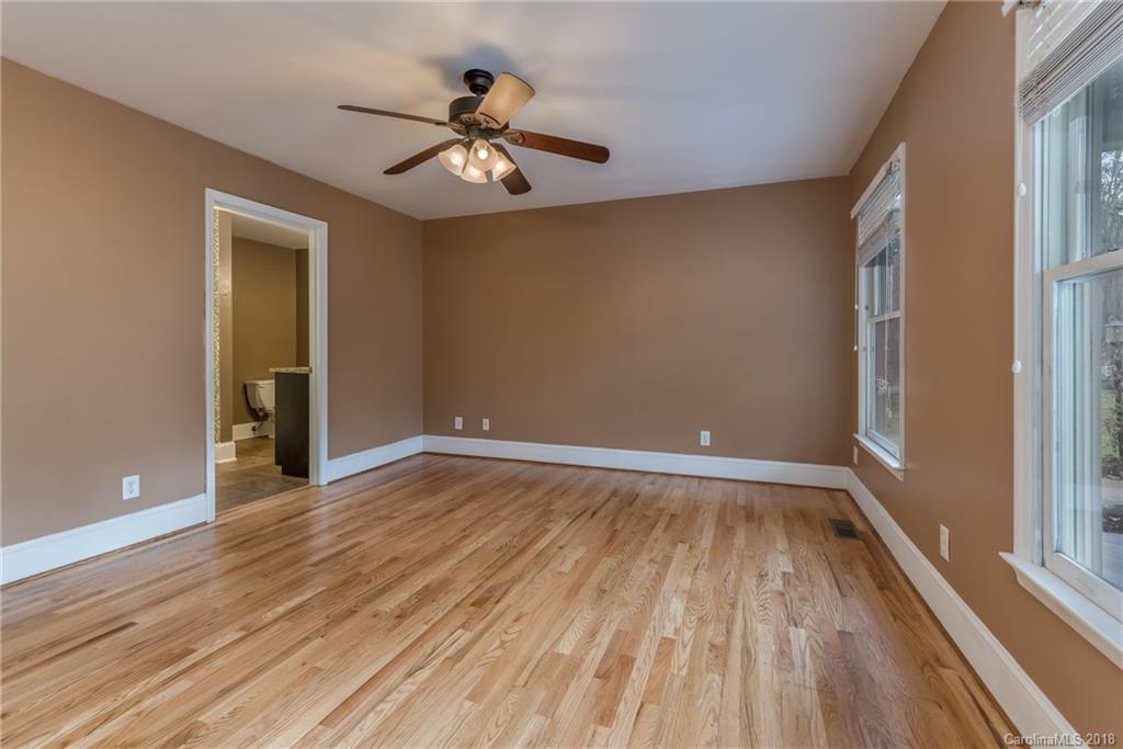278 Bent Tree Drive Rutherfordton, NC 28139 - Photo 10 of 29 a view of an empty room with wooden floor and a window