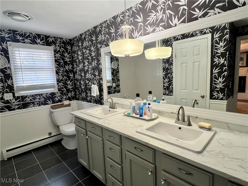 446 Annis Road Amherst, OH 44001 - Photo 25 of 39 Bathroom with vanity, tile patterned flooring, toilet