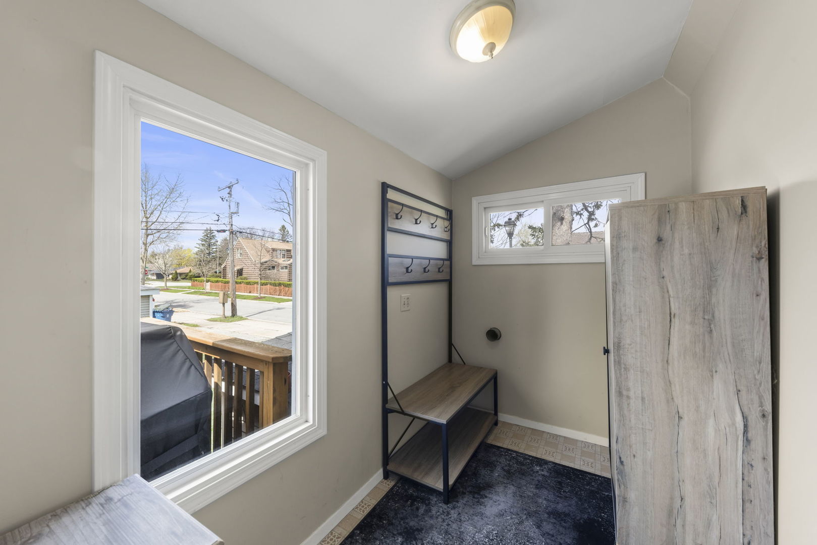 202 Pick Avenue Elmhurst, IL 60126 - Photo 11 of 26 a view of a hallway to a livingroom with furniture