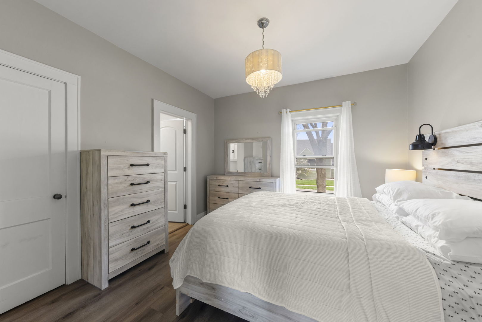 202 Pick Avenue Elmhurst, IL 60126 - Photo 13 of 26 a bedroom with a bed and wooden floor