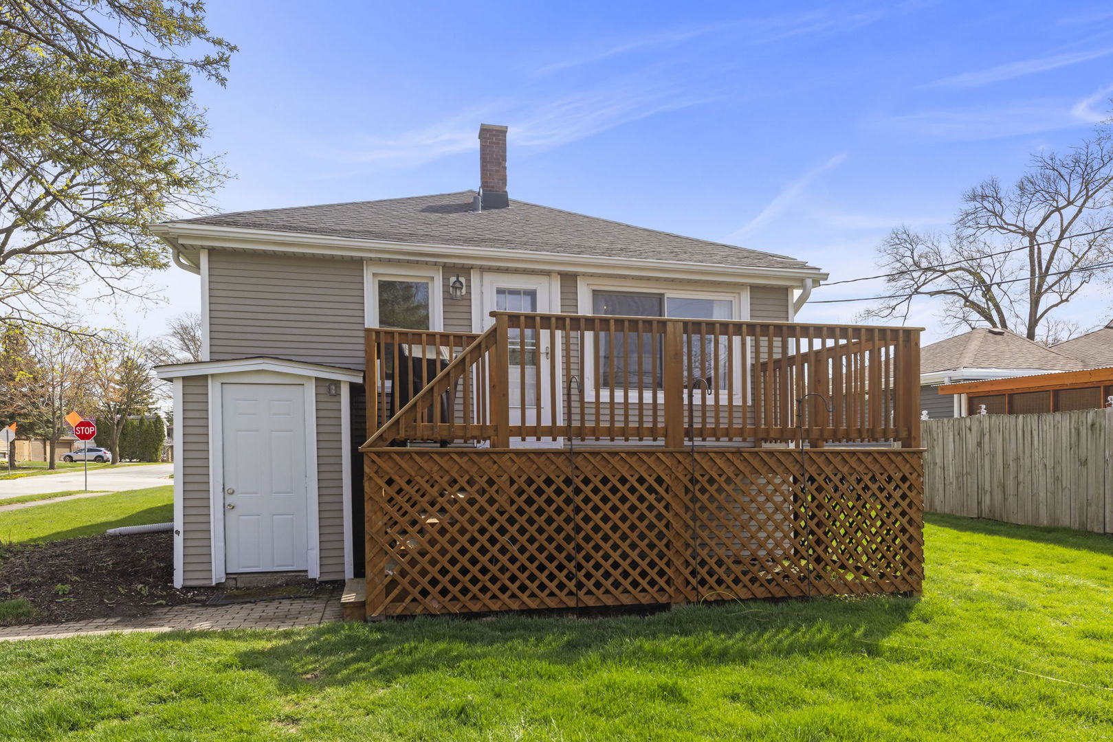 202 Pick Avenue Elmhurst, IL 60126 - Photo 24 of 26 a front view of a house with garden