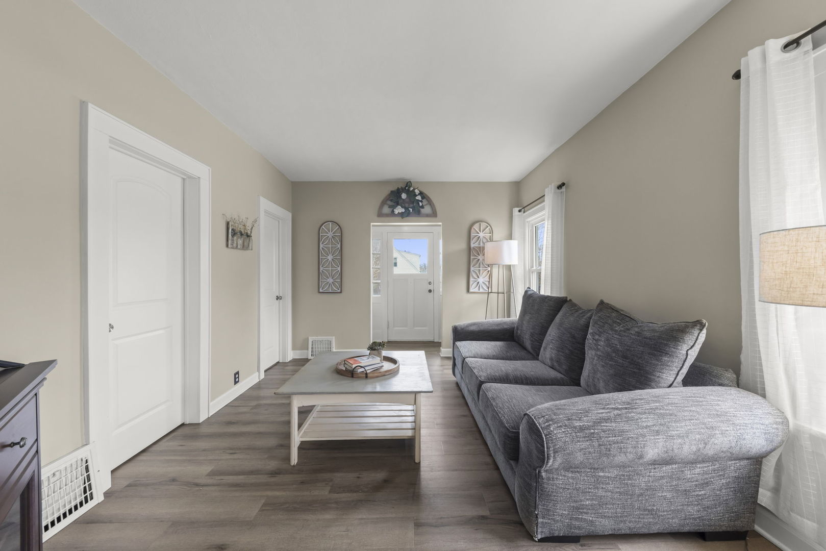 202 Pick Avenue Elmhurst, IL 60126 - Photo 6 of 26 a living room with furniture and a wooden floor