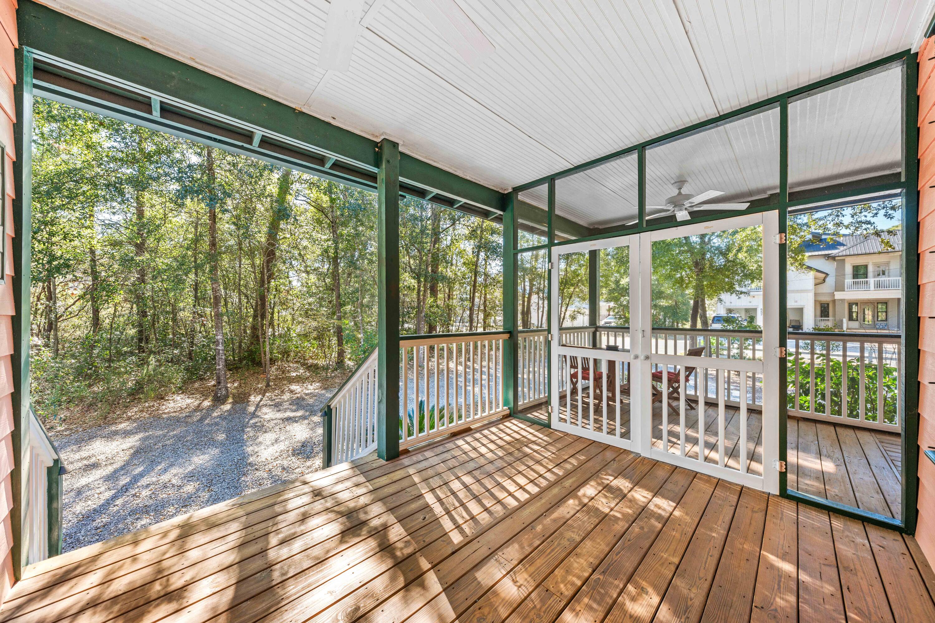 556 Little Canal Drive Santa Rosa Beach, FL 32459 - Photo 12 of 60 a view of a porch with wooden floor and outdoor space