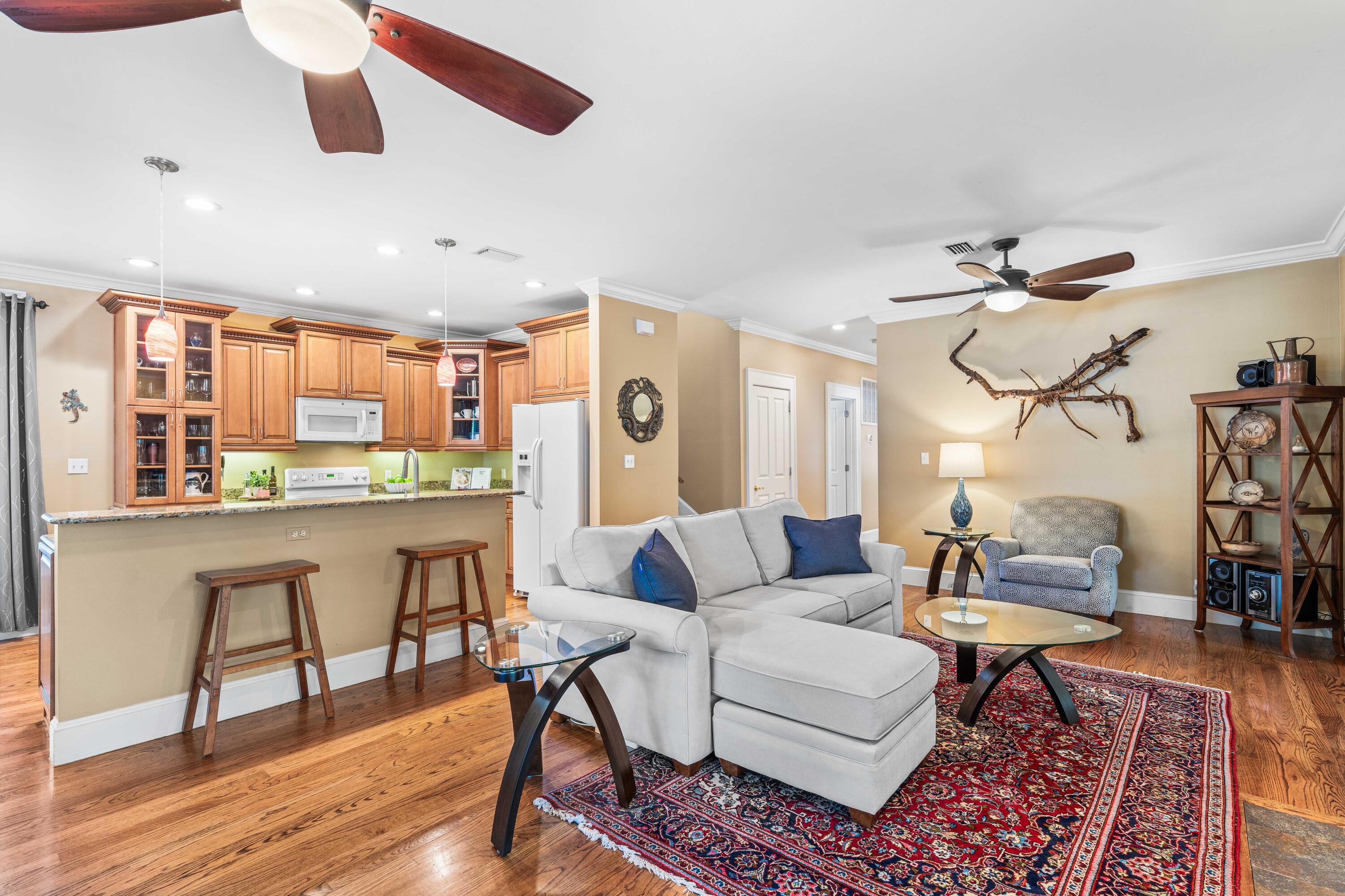 556 Little Canal Drive Santa Rosa Beach, FL 32459 - Photo 19 of 60 a living room with furniture and kitchen view