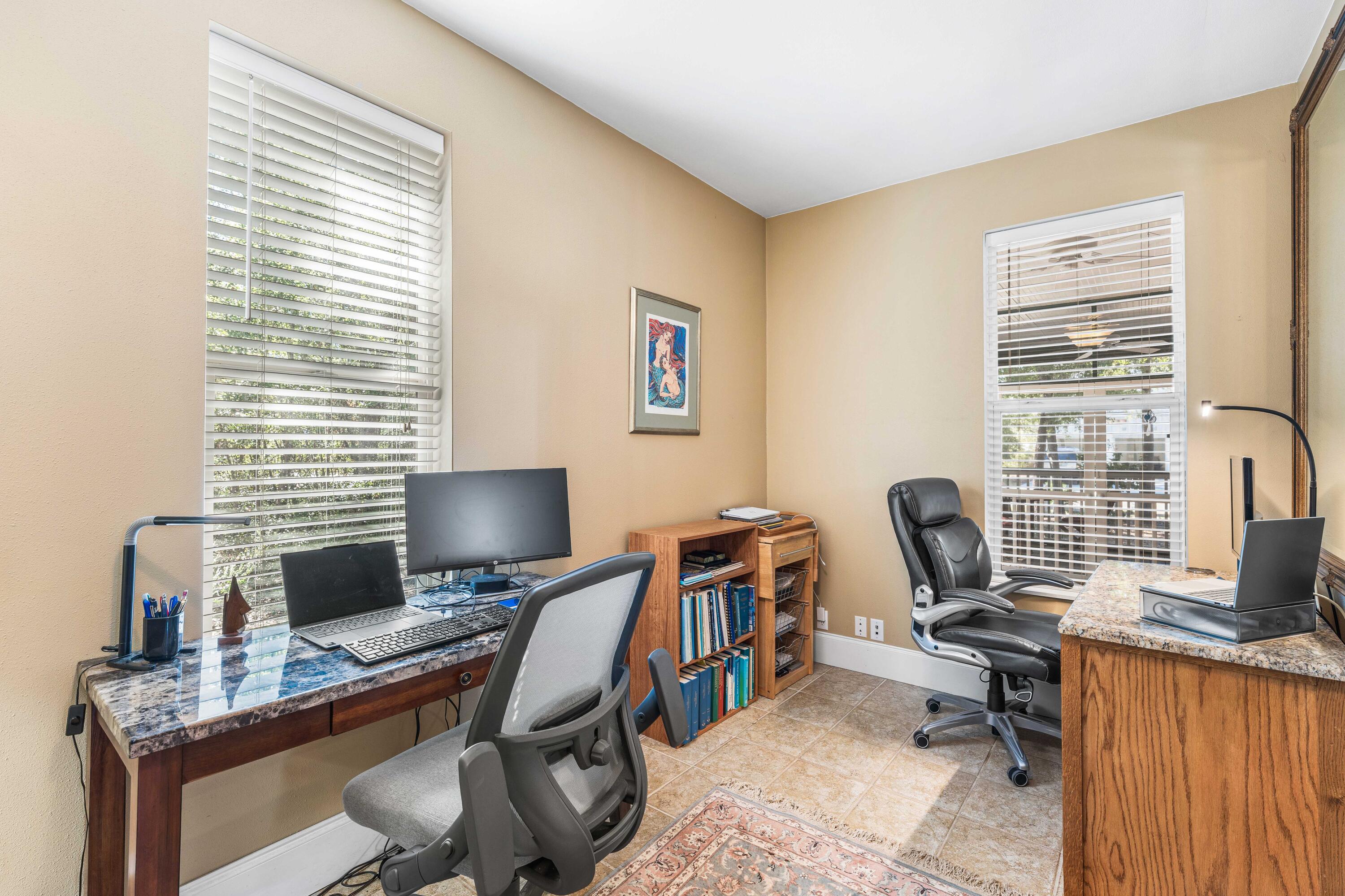 556 Little Canal Drive Santa Rosa Beach, FL 32459 - Photo 28 of 60 a view of a workspace with furniture and a window
