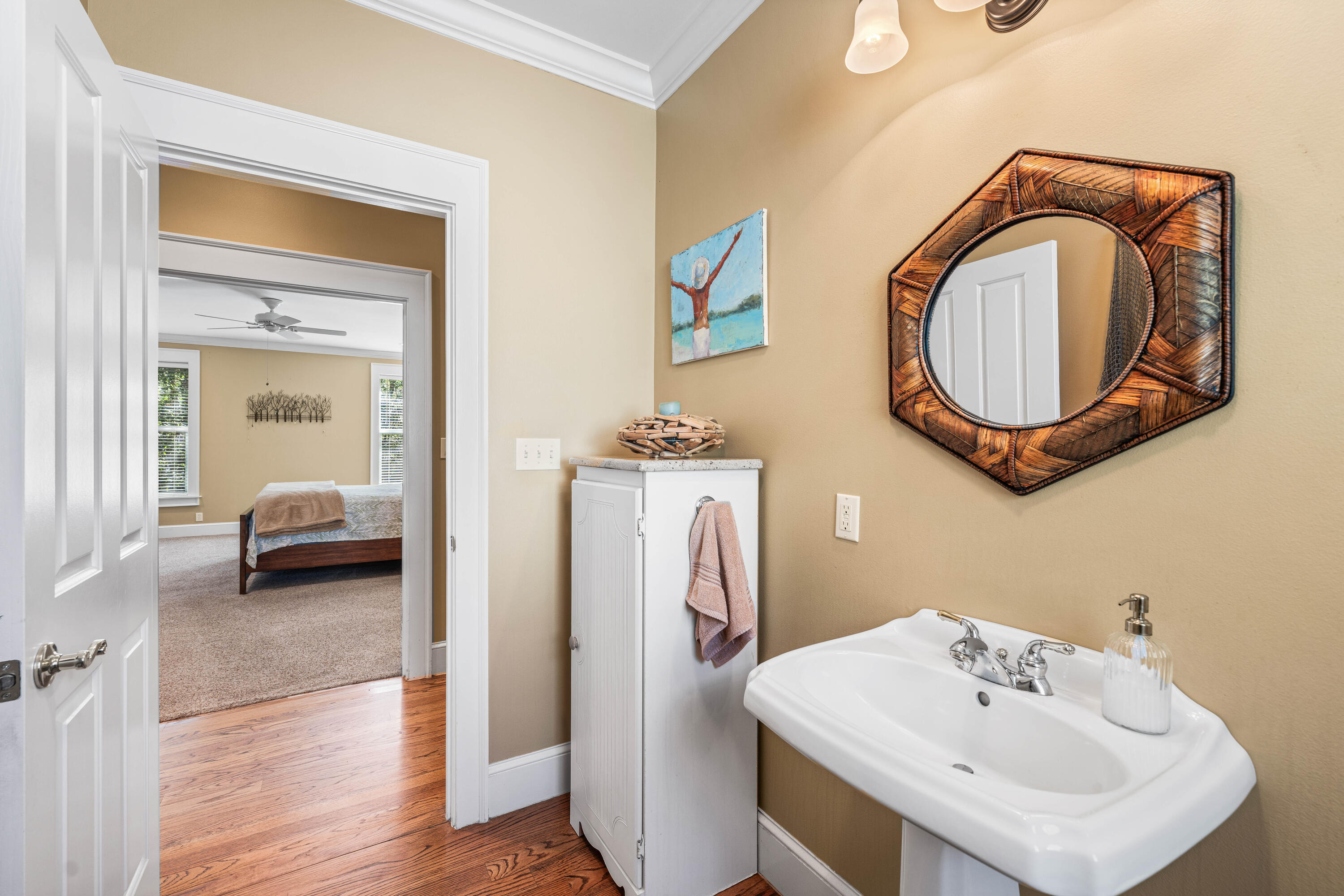 556 Little Canal Drive Santa Rosa Beach, FL 32459 - Photo 31 of 60 a en suite bathroom with a toilet and a sink