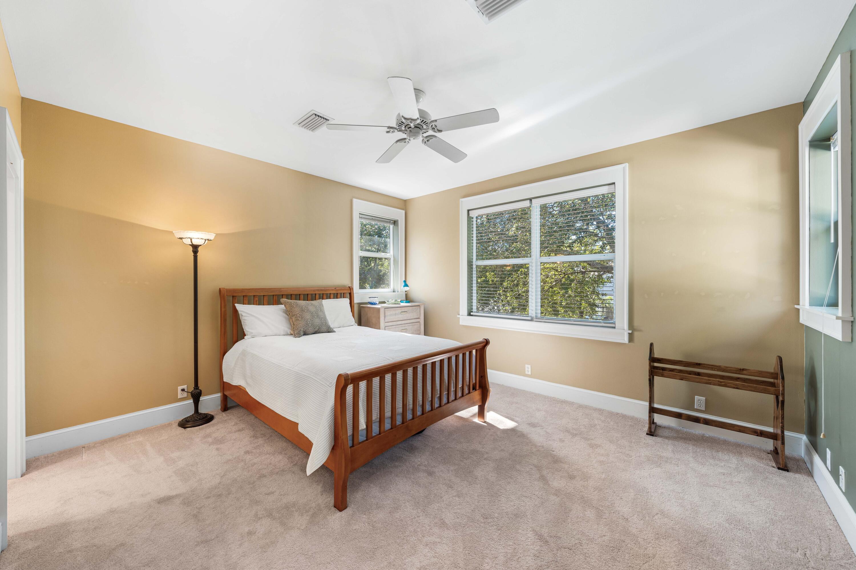 556 Little Canal Drive Santa Rosa Beach, FL 32459 - Photo 34 of 60 a bedroom with a bed and a window