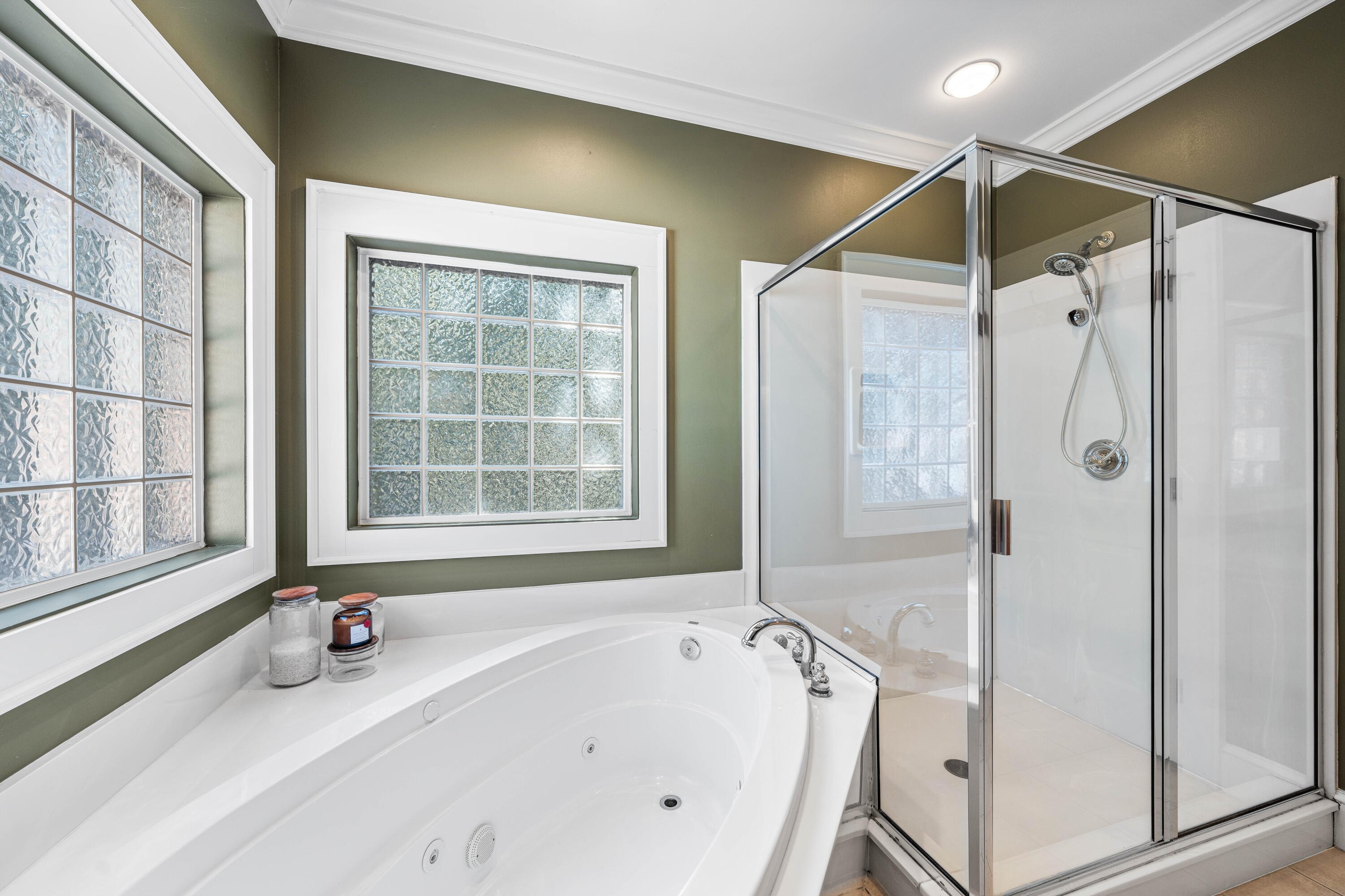 556 Little Canal Drive Santa Rosa Beach, FL 32459 - Photo 40 of 60 a bathroom with a bathtub and a shower