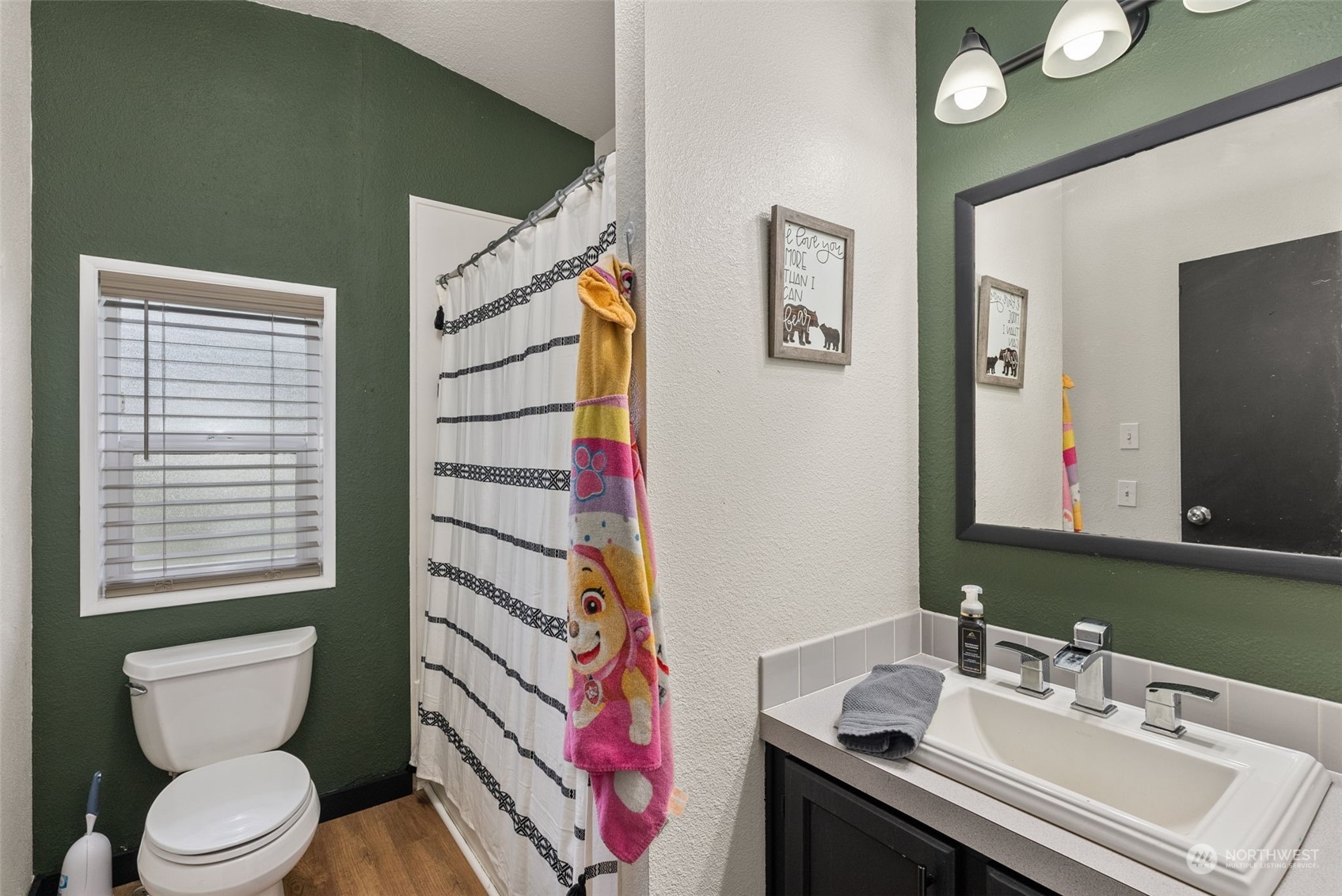 888 Logan Hill Road Chehalis, WA 98532 - Photo 18 of 35 a bathroom with a sink toilet and mirror
