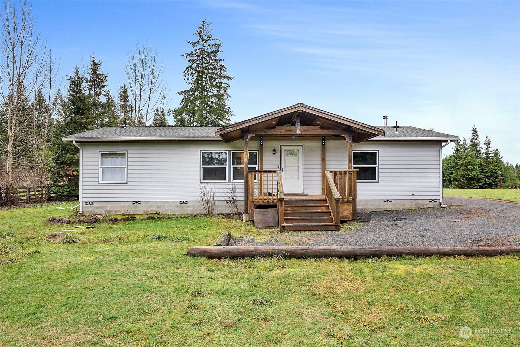888 Logan Hill Road Chehalis, WA 98532 - Photo 3 of 35 a front view of a house with garden