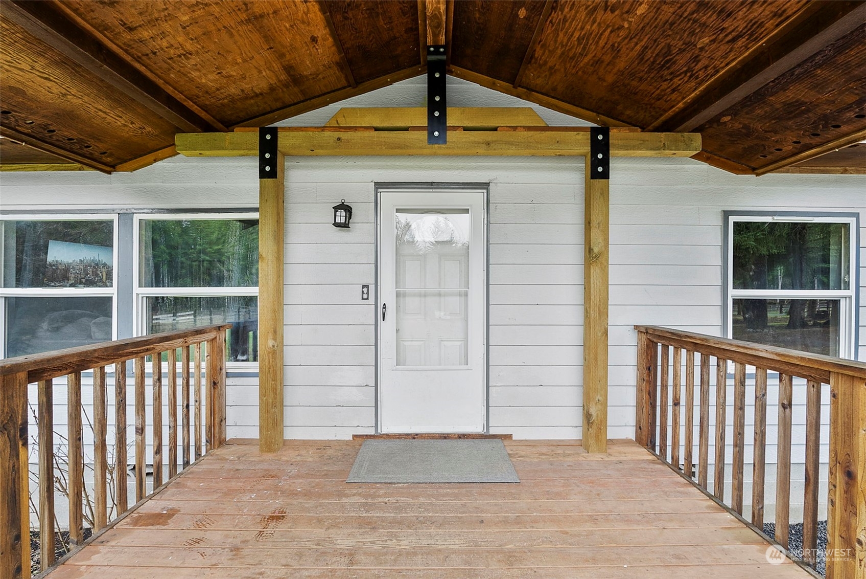 888 Logan Hill Road Chehalis, WA 98532 - Photo 4 of 35 a view of a porch with a door