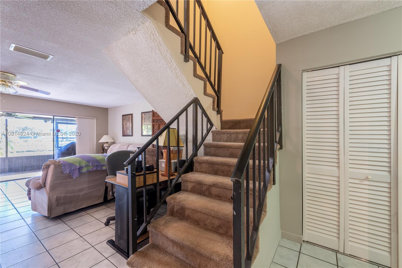 8814 Southwest 22nd Street, Unit B Boca Raton, FL 33433 - Photo 13 of 38 a living room with furniture