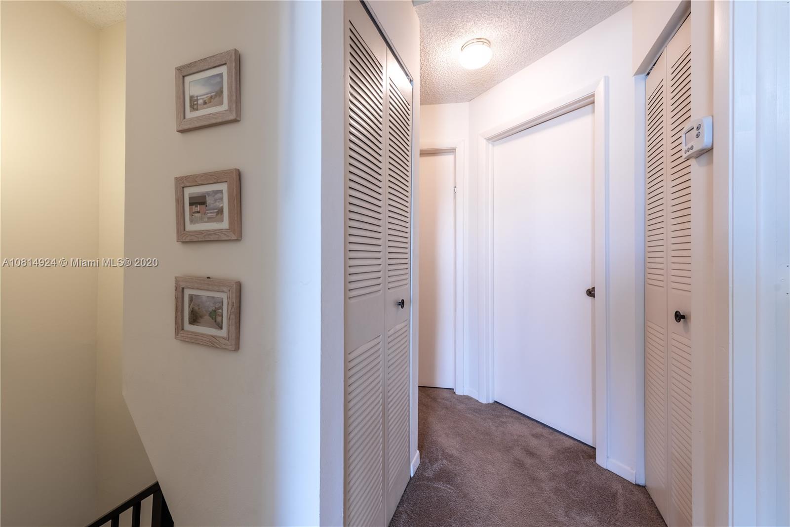 8814 Southwest 22nd Street, Unit B Boca Raton, FL 33433 - Photo 20 of 38 a view of a hallway