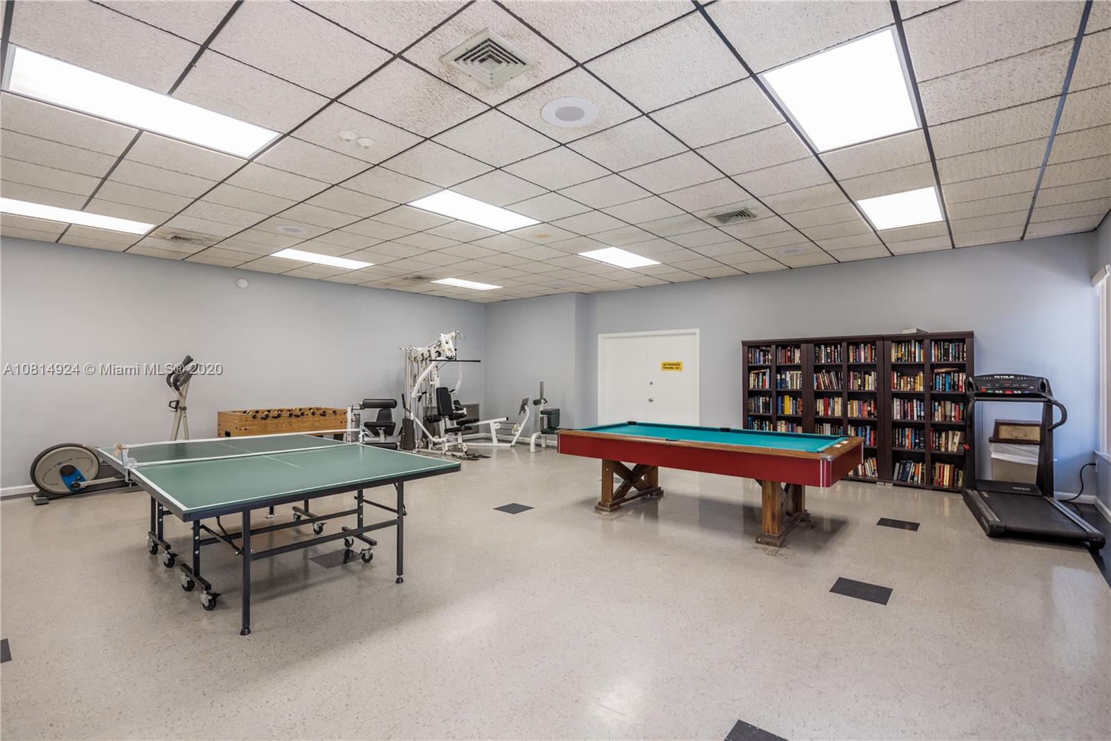 8814 Southwest 22nd Street, Unit B Boca Raton, FL 33433 - Photo 34 of 38 a reading room with furniture and a table