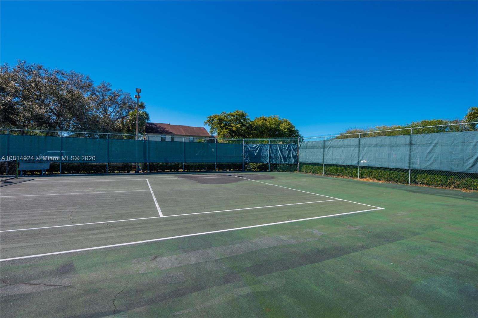 8814 Southwest 22nd Street, Unit B Boca Raton, FL 33433 - Photo 36 of 38 a view of a tennis court