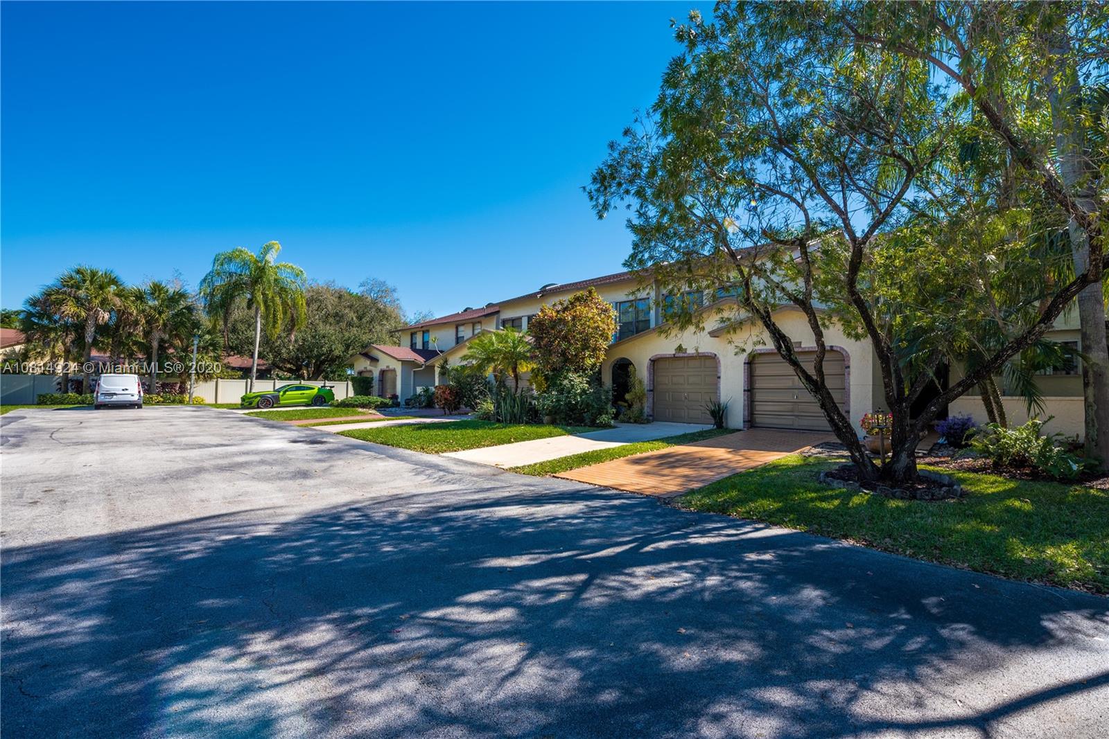 8814 Southwest 22nd Street, Unit B Boca Raton, FL 33433 - Photo 37 of 38 a view of a house with yard and a tree