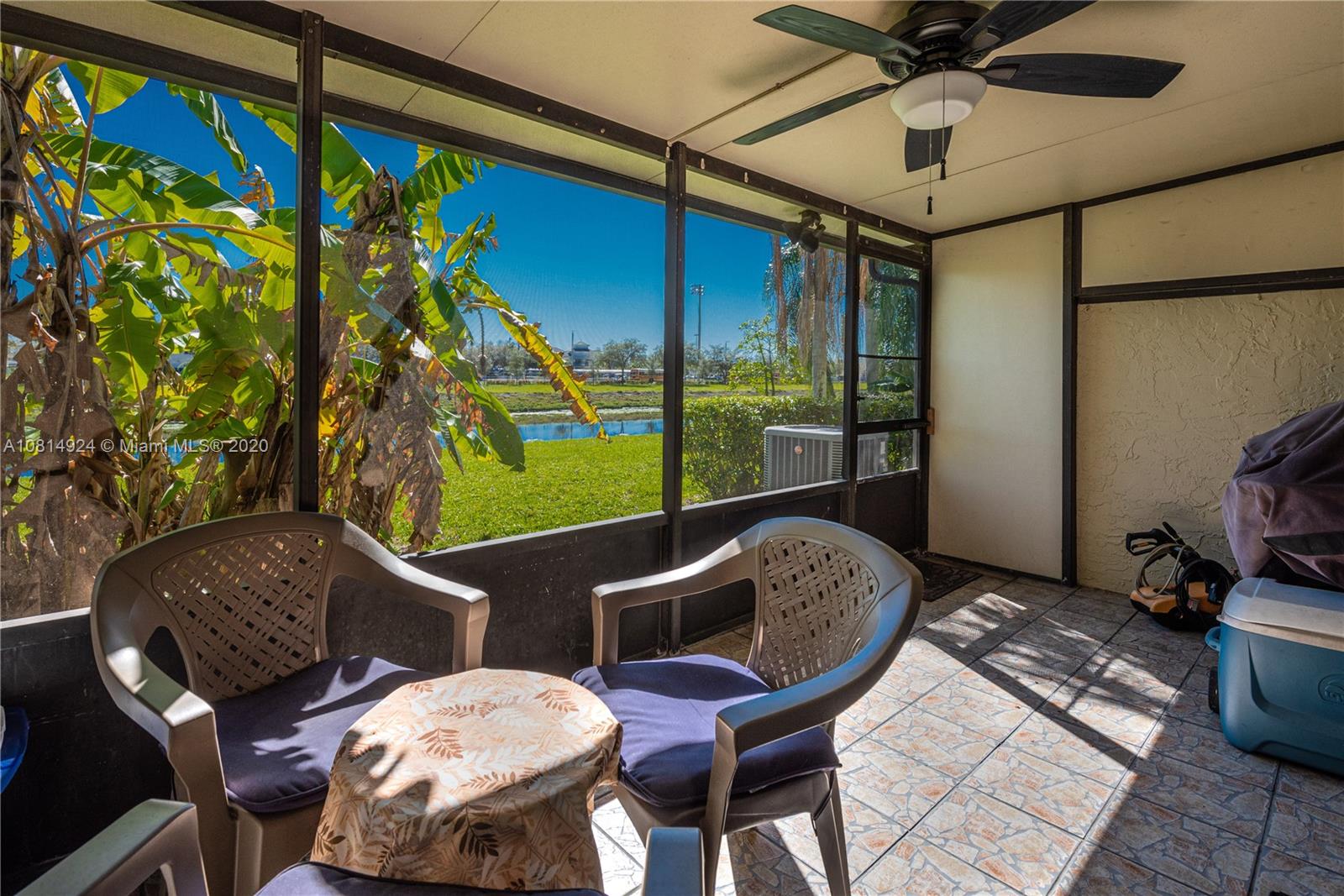 8814 Southwest 22nd Street, Unit B Boca Raton, FL 33433 - Photo 9 of 38 a balcony with furniture and a potted plant