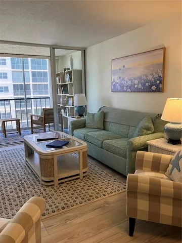 a view of a livingroom with couch