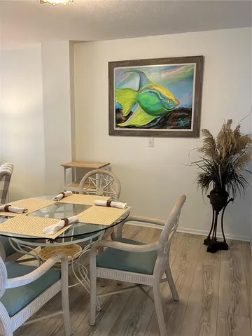 a view of staircase with wooden floor