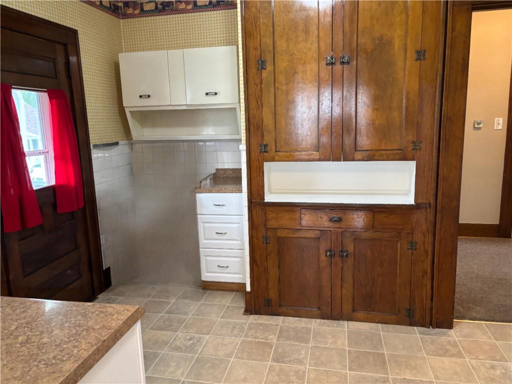 264 Hopwood Fairchance Road Uniontown, PA 15401 - Photo 4 of 19 a view of walk in closet with clothes