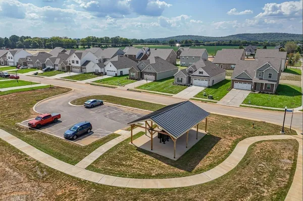 an aerial view of a house with outdoor space