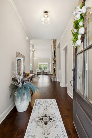 a view of a living room and dining room
